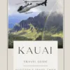 kauai travel guide Helicopter flying over Kauai mountains with rainbow