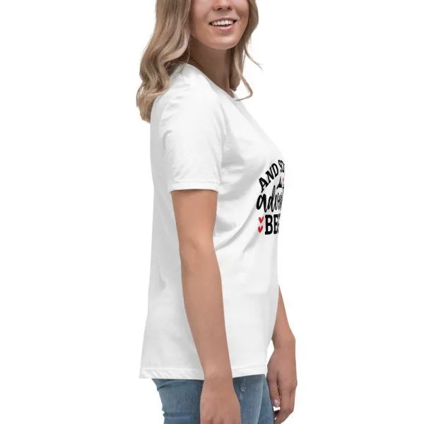 Woman wearing white printed T-shirt, side view