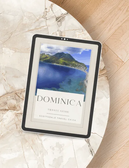 Dominica travel guide displayed on tablet.