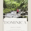 Woman crossing river in Dominica jungle.