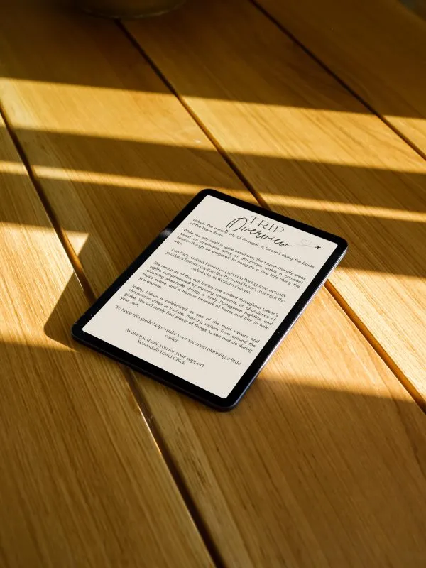 Maui Overview Mockup-min Tablet displaying trip overview on wooden table.