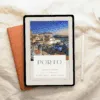 Tablet showing Porto travel guide cover on table.